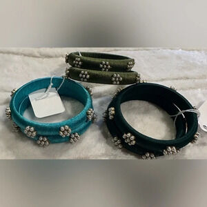 Set of 2 matching bangle bracelets with pearl details. Choice of colors.